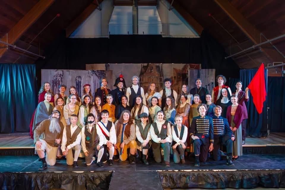 Troubadours drama cast on stage