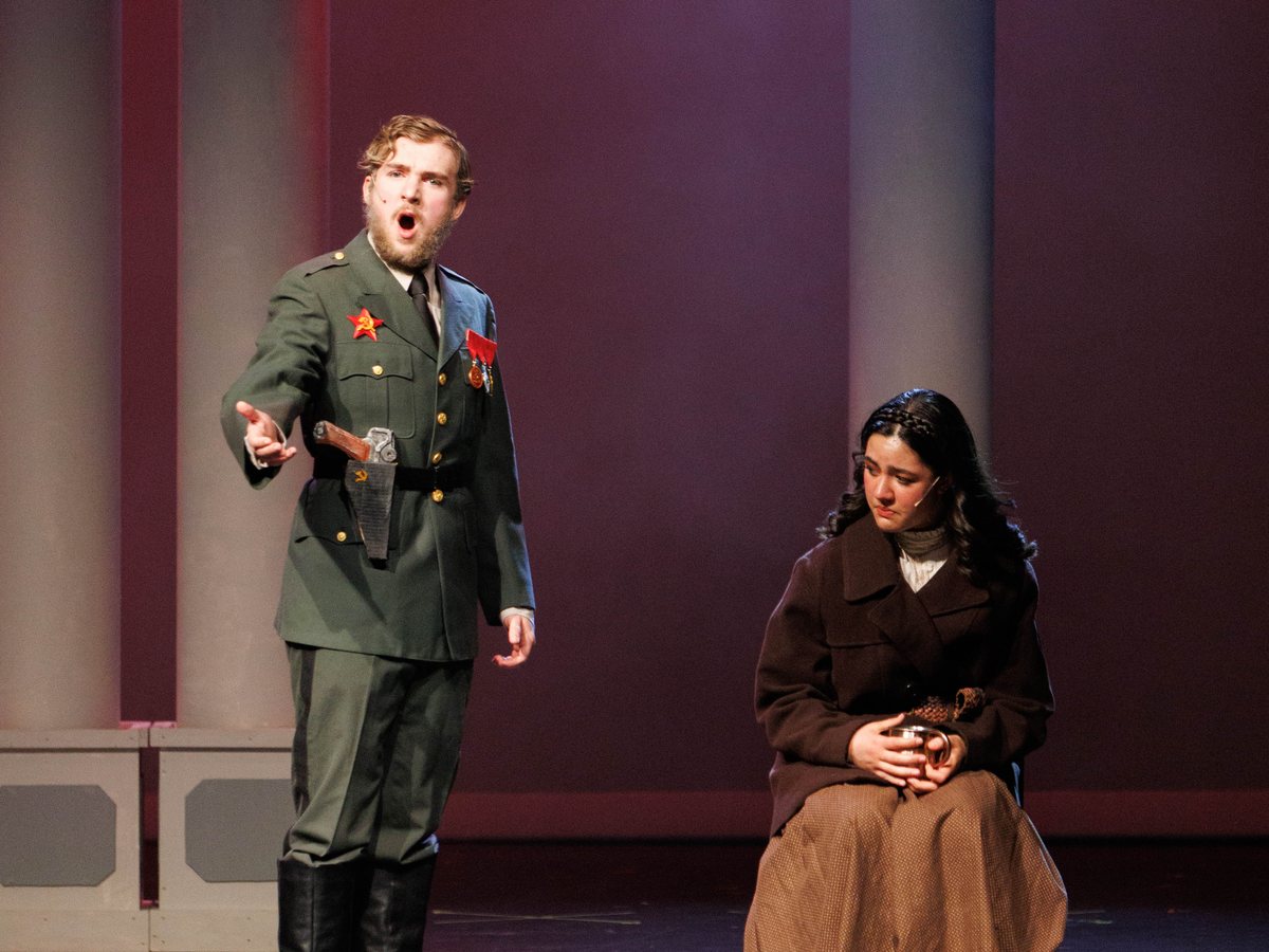 Anastasia: an officer sings to Anya