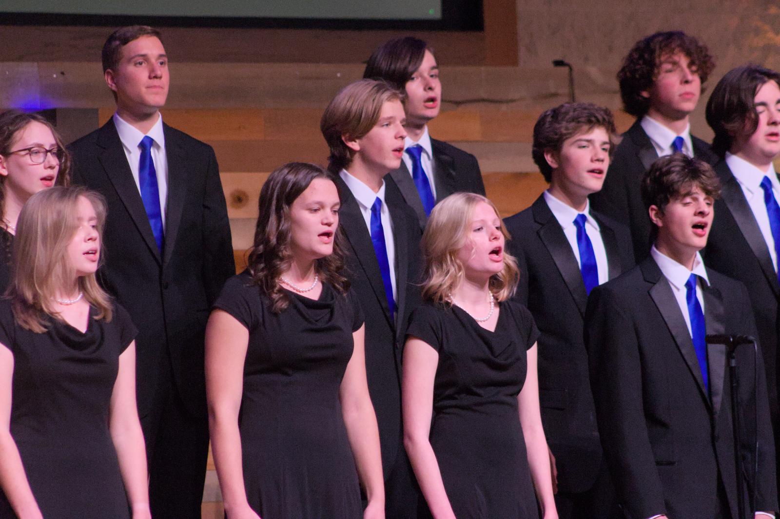 Troubadours choir singing in concert