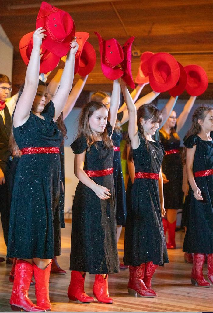 Show choir in red boots
