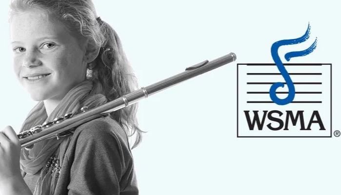 Student playing flute with the WSMA logo
